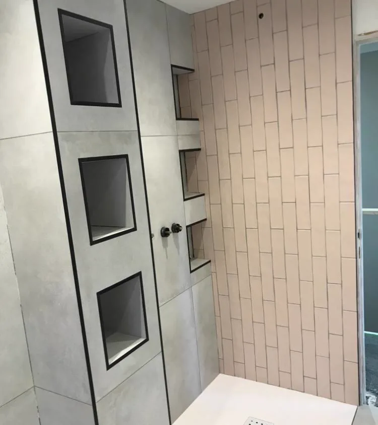 Luxury bathroom with large format tiles installed by Banks and Co Ceramics, Sussex