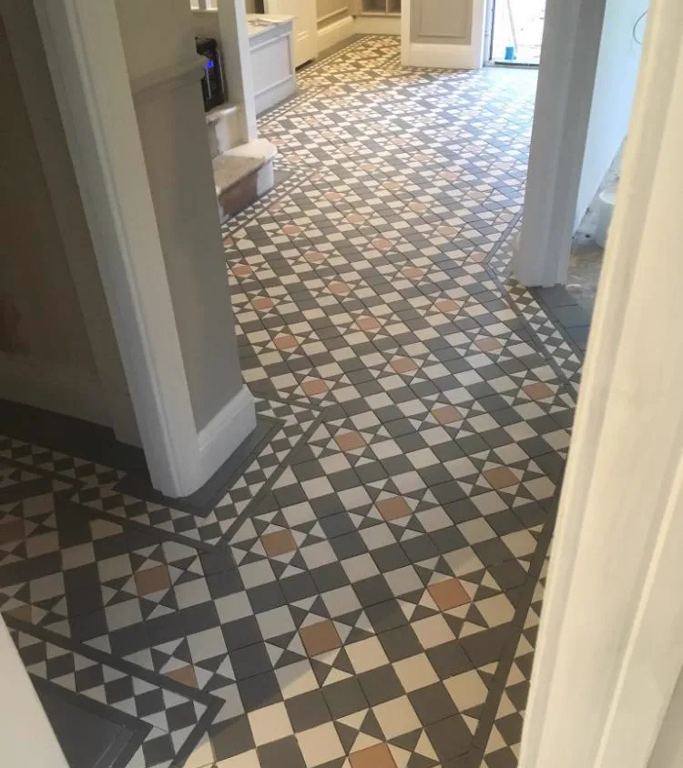 Grey and terracotta geometric Victorian floor tiles in a period Sussex hallway, Banks and Co Ceramics